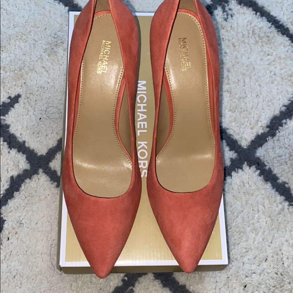 Michael kors pumps. Size was a bit tight for me!